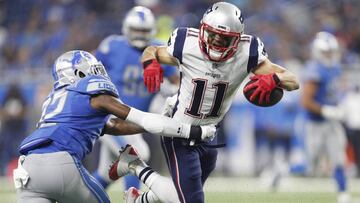 Aug 25, 2017; Detroit, MI, USA; New England Patriots wide receiver Julian Edelman (11) gets tackled by Detroit Lions strong safety Tavon Wilson (32) during the first quarter at Ford Field. Mandatory Credit: Raj Mehta-USA TODAY Sports