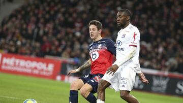 Domagoj Bradaric of Lille, Karl Toko Ekambi of Lyon during the French championship Ligue 1 football match between Lille OSC and Olympique Lyonnais on March 8, 2020 at Pierre Mauroy stadium in Villeneuve-d'Ascq near Lille, France - Photo Juan Soliz /