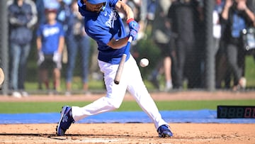 Feb 17, 2024; Glendale, AZ, USA;  Los Angeles Dodgers second baseman Mookie Betts (50) takes live batting practice during spring training at Camelback Ranch. Mandatory Credit: Jayne Kamin-Oncea-USA TODAY Sports