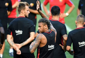 Barcelona's Neymar waves at fans during a training session at the Red Bull Arena in Harrison, New Jersey.