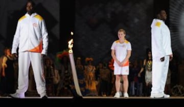 The Pan American Games Torch arrives during the opening ceremony for the 2015 Pan American Games at the Rogers Centre in Toronto, Ontario, on July 10, 2015. AFP PHOTO/HECTOR RETAMAL