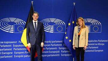 Prime Minister Alexander De Croo and European Parliament chairwoman Roberta Metsola pose for the photographer at a bilateral meeting between European Parliament new chairwoman and Belgian Prime Minister, in Brussels, on February 8, 2022. (Photo by ERIC LA