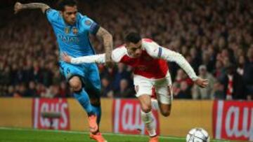 Daniel Alves y Alexis Sánchez