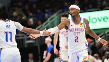 Mar 16, 2025; Milwaukee, Wisconsin, USA; Oklahoma City Thunder guard Shai Gilgeous-Alexander (2) celebrates with guard Isaiah Joe (11) after score in the fourth quarter against the Milwaukee Bucks at Fiserv Forum. Mandatory Credit: Benny Sieu-Imagn Images