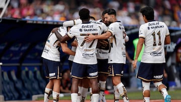 Pumas' players celebrate their team's third goal during the Liga MX Apertura tournament football match between Pumas and Tijuana at the Olimpico Universitario Stadium in Mexico City on November 2, 2025. (Photo by Rodrigo Oropeza / AFP)