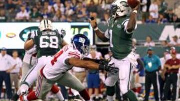 Michael Vick jugando para los New York Jets.
