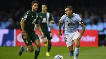 VIGO, SPAIN - SEPTEMBER 26: Hugo Mallo of Celta de Vigo competes for the ball against Didac Vila of Espanyol during the Liga match between RC Celta de Vigo and RCD Espanyol at Abanca-Balaídos on September 26, 2019 in Vigo, Spain. (Photo by Octavio