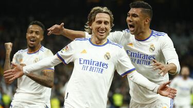 Real Madrid's Luka Modric celebrates scoring their second goal with Casemiro and Eder Militao