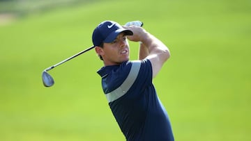 Rory McIlroy of Northern Ireland plays his second shot on the 13th hole during round four of the Abu Dhabi HSBC Golf Championship