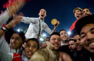 Locals celebrate in Marrakech after Morocco's victory over Ivory Coast in their FIFA 2018 World Cup Play-Off.