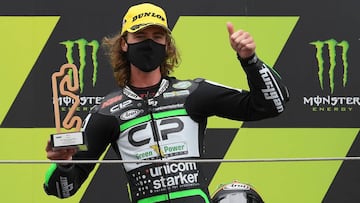 CIP Green Power's South African rider Darryn Binder celebrates his victory on the podium after the Moto3 race of the Moto Grand Prix de Catalunya at the Circuit de Catalunya on September 27, 2020 in Montmelo on the outskirts of Barcelona. (Photo by LLUIS GENE / AFP)