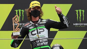 CIP Green Power&#039;s South African rider Darryn Binder celebrates his victory on the podium after the Moto3 race of the Moto Grand Prix de Catalunya at the Circuit de Catalunya on September 27, 2020 in Montmelo on the outskirts of Barcelona. (Photo by LLUIS GENE / AFP)