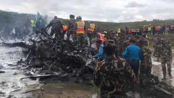 Emergency services work at the accident site of a Saurya Airlines plane that caught fire after skidding off the runway while taking off, in Kathmandu, Nepal July 24, 2024. NepaliArmyHQ via X/Handout via REUTERS THIS IMAGE HAS BEEN SUPPLIED BY A THIRD PARTY. NO RESALES. NO ARCHIVES. MANDATORY CREDIT. BEST QUALITY AVAILABLE. TPX IMAGES OF THE DAY
