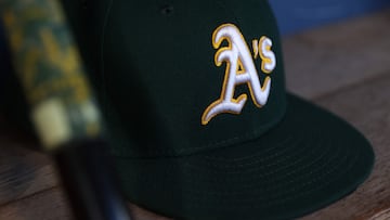 SEATTLE, WASHINGTON - SEPTEMBER 27: A general view of an Oakland Athletics logo and hat before the game against the Seattle Mariners at T-Mobile Park on September 27, 2024 in Seattle, Washington. Steph Chambers/Getty Images/AFP (Photo by Steph Chambers / GETTY IMAGES NORTH AMERICA / Getty Images via AFP)
