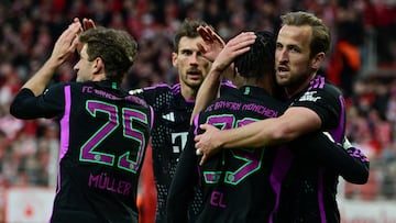 Bayern Munich's French forward #39 Mathys Tel (2nd R) celebrates scoring the 0-4 goal with his team-mates including Bayern Munich's English forward #09 Harry Kane (R) during the German first division Bundesliga football match between 1 FC Union Berlin and FC Bayern Munich in Berlin, on April 20, 2024. (Photo by JOHN MACDOUGALL / AFP) / DFL REGULATIONS PROHIBIT ANY USE OF PHOTOGRAPHS AS IMAGE SEQUENCES AND/OR QUASI-VIDEO