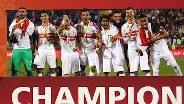 Soccer Football - African Super Cup Final - Esperance Sportive de Tunis v Zamalek - Thani bin Jassim Stadium, Al Rayyan, Qatar - February 14, 2020  Zamalek players celebrate winning the African Super Cup Final with their medals  REUTERS/Ibraheem Al Omari