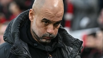 Manchester City's Spanish manager Pep Guardiola reacts before the start of the English Premier League football match between Liverpool and Manchester City at Anfield in Liverpool, north west England on February 8, 2026. (Photo by Paul ELLIS / AFP) / RESTRICTED TO EDITORIAL USE. No use with unauthorized audio, video, data, fixture lists, club/league logos or 'live' services. Online in-match use limited to 120 images. An additional 40 images may be used in extra time. No video emulation. Social media in-match use limited to 120 images. An additional 40 images may be used in extra time. No use in betting publications, games or single club/league/player publications. /