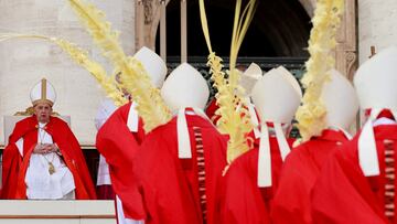 Members of the clergy hold palms as Pope Francis presides over the Palm Sunday Mass in Saint Peter's Square at the Vatican, March 24, 2024. REUTERS/Yara Nardi     TPX IMAGES OF THE DAY