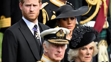 FILE PHOTO: Britain's Meghan, Duchess of Sussex, cries as she, Prince Harry, Duke of Sussex, Queen Camilla and King Charles attend the state funeral and burial of Britain's Queen Elizabeth, in London, Britain, September 19, 2022.       REUTERS/Toby Melville/File Photo