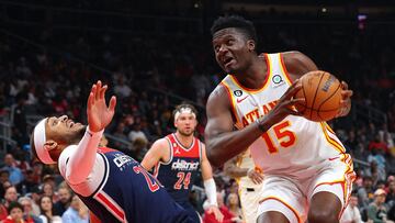 ATLANTA, GEORGIA - APRIL 05: Clint Capela #15 of the Atlanta Hawks draws a foul as he drives against Daniel Gafford #21 of the Washington Wizards during the first quarter at State Farm Arena on April 05, 2023 in Atlanta, Georgia. NOTE TO USER: User expressly acknowledges and agrees that, by downloading and or using this photograph, User is consenting to the terms and conditions of the Getty Images License Agreement. Kevin C. Cox/Getty Images/AFP (Photo by Kevin C. Cox / GETTY IMAGES NORTH AMERICA / Getty Images via AFP)