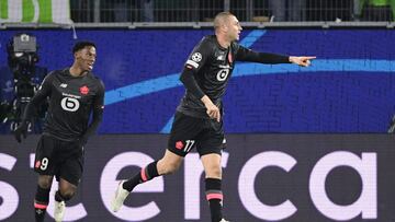 Soccer Football - Champions League - Group G - VfL Wolfsburg v Lille - Volkswagen Arena, Wolfsburg, Germany - December 8, 2021 Lille&#039;s Burak Y&Auml;&plusmn;lmaz celebrates scoring their first goal REUTERS/Fabian Bimmer