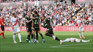 El Girona celebra uno de los goles conseguidos en Vallecas.