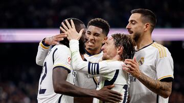 Soccer Football - Real Madrid v RCD Mallorca - Santiago Bernabeu, Madrid, Spain - January 3, 2024 Real Madrid's Antonio Rudiger celebrates scoring their first goal with teammates REUTERS/Juan Medina