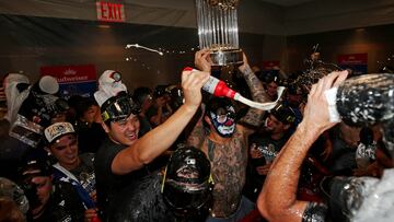 Oct 31, 2024; New York, New York, USA; Los Angeles Dodgers two-way player Shohei Ohtani (17) celebrates in the locker room after the Los Angeles Dodgers beat the New York Yankees in game four to win the 2024 MLB World Series at Yankee Stadium. Mandatory Credit: Brad Penner-Imagn Images