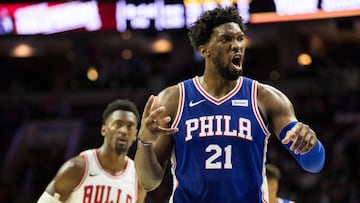 Oct 18, 2018; Philadelphia, PA, USA; Philadelphia 76ers center Joel Embiid (21) reacts after being called for a foul against Chicago Bulls forward Bobby Portis (5) during the second quarter at Wells Fargo Center. Mandatory Credit: Bill Streicher-USA TODAY Sports