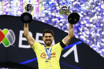     Henry Martin lifts the Clausura 2024 champion and Champion of Champions trophies  during the final second leg match between America and Cruz Azul as part of the Torneo Clausura 2024 Liga BBVA MX at Azteca Stadium on May 26, 2024 in Mexico City, Mexico.