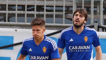 Giuliano Simeone y Eugeni Valderrama.