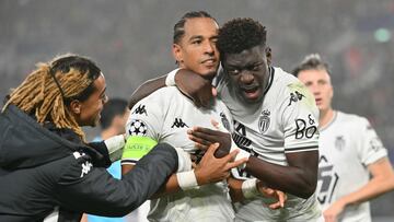 Monaco's German defender #05 Thilo Kehrer (C) celebrates scoring his team's first goal with teammates during the Champions League football match between Bologna FC and AS Monaco at the Renato Dall'Ara stadium in Bologna on November 5, 2024. (Photo by Alberto PIZZOLI / AFP)