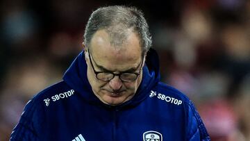 Leeds United's Argentinian head coach Marcelo Bielsa reacts at the end of the English Premier League football match between Liverpool and Leeds at the Anfield stadium, in Liverpool, north west England on February 23, 2022. (Photo by Lindsey Parnaby / AFP) / RESTRICTED TO EDITORIAL USE. No use with unauthorized audio, video, data, fixture lists, club/league logos or 'live' services. Online in-match use limited to 120 images. An additional 40 images may be used in extra time. No video emulation. Social media in-match use limited to 120 images. An additional 40 images may be used in extra time. No use in betting publications, games or single club/league/player publications. / 