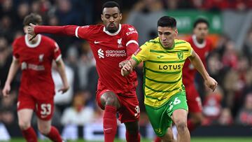 Norwich City's Chilean midfielder #26 Marcelino Nunez (R) vies with Liverpool's Dutch midfielder #38 Ryan Gravenberch during the English FA Cup fourth round football match between Liverpool and Norwich City at Anfield in Liverpool, north west England on January 28, 2024. (Photo by Paul ELLIS / AFP) / RESTRICTED TO EDITORIAL USE. No use with unauthorized audio, video, data, fixture lists, club/league logos or 'live' services. Online in-match use limited to 120 images. An additional 40 images may be used in extra time. No video emulation. Social media in-match use limited to 120 images. An additional 40 images may be used in extra time. No use in betting publications, games or single club/league/player publications. / 