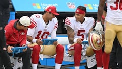 CHICAGO, IL - SEPTEMBER 11: San Francisco 49ers quarterbacks Trey Lance (5) and Jimmy Garoppolo (10) chat during a game between the San Francisco 49ers and the Chicago Bears on September 11, 2022 at Soldier Field in Chicago, IL. (Photo by Robin Alam/Icon Sportswire via Getty Images)