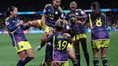 Colombia's players celebrate after Colombia's midfielder #02 Manuela Vanegas (unseen) scored her team's second goal during the Australia and New Zealand 2023 Women's World Cup Group H football match between Germany and Colombia at Sydney Football Stadium in Sydney on July 30, 2023. (Photo by FRANCK FIFE / AFP)