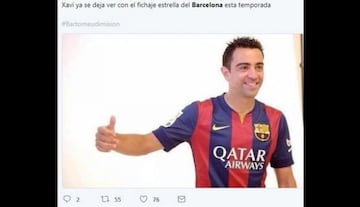 Xavi poses with Barcelona's star signing this year