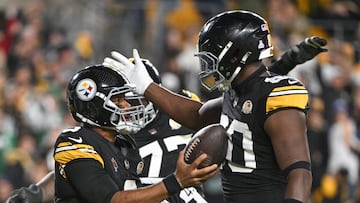 Oct 20, 2024; Pittsburgh, Pennsylvania, USA; Pittsburgh Steelers quarterback Russell Wilson (3) celebrates a touchdown with tight end Darnell Washington (80) against the New York Jets during the third quarter at Acrisure Stadium. Mandatory Credit: Barry Reeger-Imagn Images