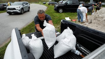 Bob Gendron loads sandbags onto his truck, as they are distributed to Pinellas County residents before the expected arrival of Tropical Storm Milton, in Seminole, Florida, U.S. October 6, 2024. REUTERS/Octavio Jones