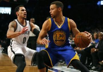 Shane Larkin y Stephen Curry.