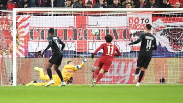 Salzburg's Austrian goalkeeper Cican Stankovic deflects the ball during the UEFA Champions League Group E football match between RB Salzburg and Liverpool FC on December 10, 2019 in Salzburg, Austria. (Photo by JOE KLAMAR / AFP)