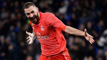 Real Madrid&#039;s French forward Karim Benzema celebrates after scoring a goal during the Spanish league football match between RCD Espanyol and Real Madrid CF atxA0the RCDE Stadium in Cornella de Llobregat on January 27, 2019. (Photo by Josep LAGO / AFP