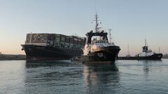 A handout picture released by the Suez Canal Authority on March 29, 2021 shows tugboats pulling the Panama-flagged MV &#039;Ever Given&#039; (operated by Taiwan-based Evergreen Marine) container ship, a 400-metre- (1,300-foot-)long and 59-metre wide vesse