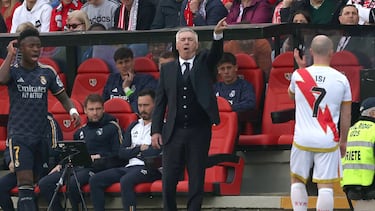 Real Madrid's Italian coach Carlo Ancelotti gestures on the sidelines during the Spanish league football match Rayo Vallecano de Madrid and Real Madrid CF at the Vallecas stadium in Madrid on February 18, 2024. (Photo by Pierre-Philippe MARCOU / AFP)