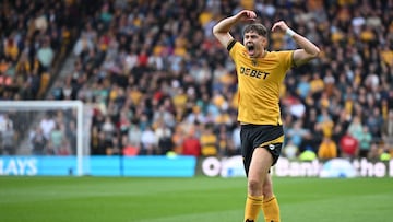 Wolverhampton Wanderers' Norwegian striker #09 Jorgen Strand Larsen reacts to a missed chance during the English Premier League football match between Wolverhampton Wanderers and Chelsea at the Molineux stadium in Wolverhampton, central England on August 25, 2024. (Photo by JUSTIN TALLIS / AFP) / RESTRICTED TO EDITORIAL USE. No use with unauthorized audio, video, data, fixture lists, club/league logos or 'live' services. Online in-match use limited to 120 images. An additional 40 images may be used in extra time. No video emulation. Social media in-match use limited to 120 images. An additional 40 images may be used in extra time. No use in betting publications, games or single club/league/player publications. /