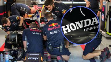 Mec&aacute;nicos de Red Bull y el logotipo de Honda.