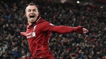 Liverpool&#039;s Swiss midfielder Xherdan Shaqiri celebrates after scoring their third goal during the English Premier League football match between Liverpool and Manchester United at Anfield in Liverpool, north west England on December 16, 2018. (Photo b