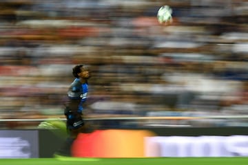 Club Brugge's South African forward Percy Tau eyes the ball during the UEFA Champions league Group A football match between Real Madrid and Club Brugge at the Santiago Bernabeu stadium in Madrid on October 1, 2019.