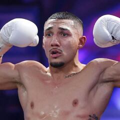 How many titles has Teofimo Lopez won and what is his professional record?