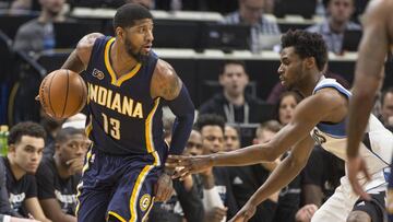 Jan 26, 2017; Minneapolis, MN, USA; Indiana Pacers forward Paul George (13) looks to pass the ball as Minnesota Timberwolves forward Andrew Wiggins (22) defends in the second half at Target Center. The Pacers won 109-103. Mandatory Credit: Jesse Johnson-USA TODAY Sports